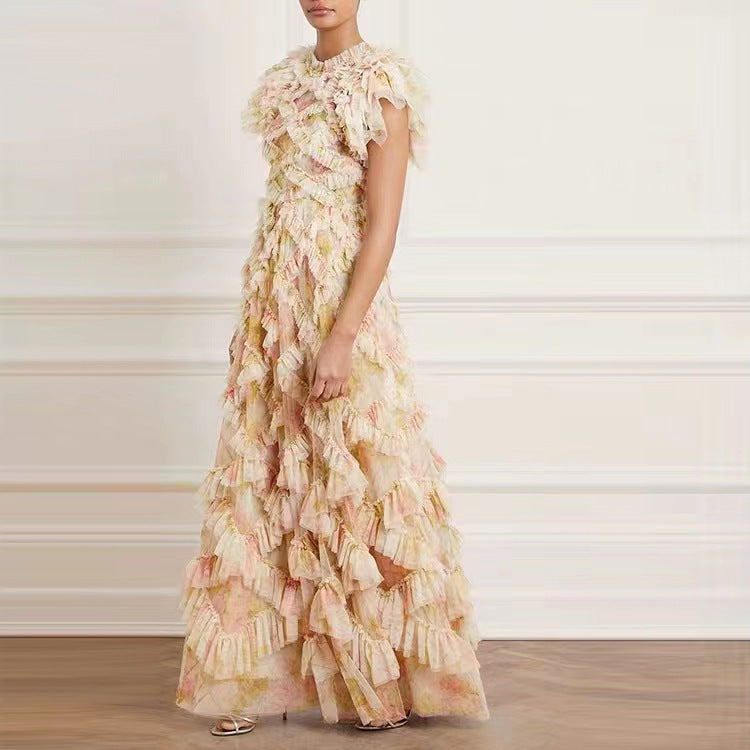 An irregular round-neck dress with patchwork prints