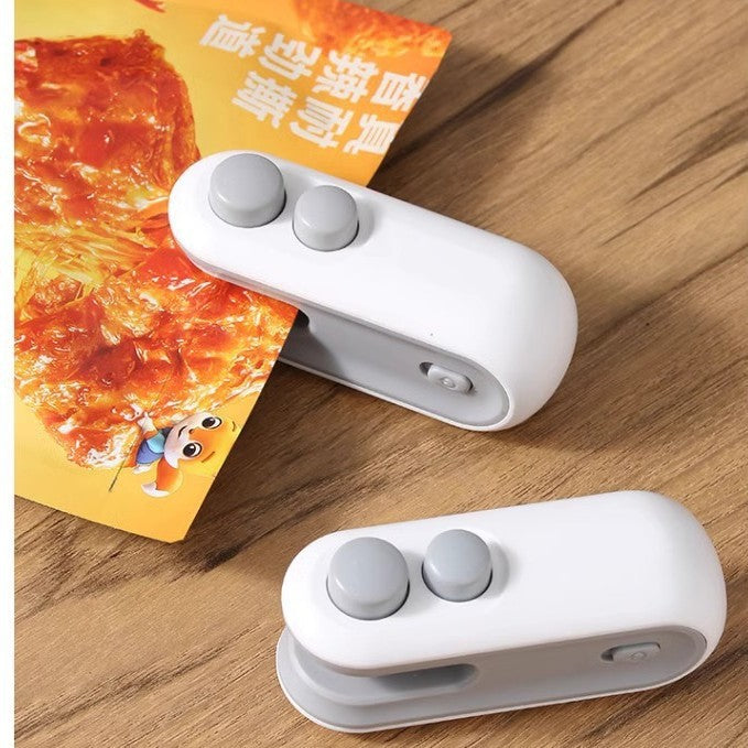 Mini hand-press sealing machine